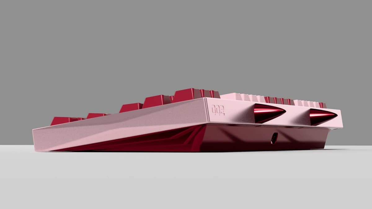 Code:002 side render showing its pink upper case, red base and rear horns.