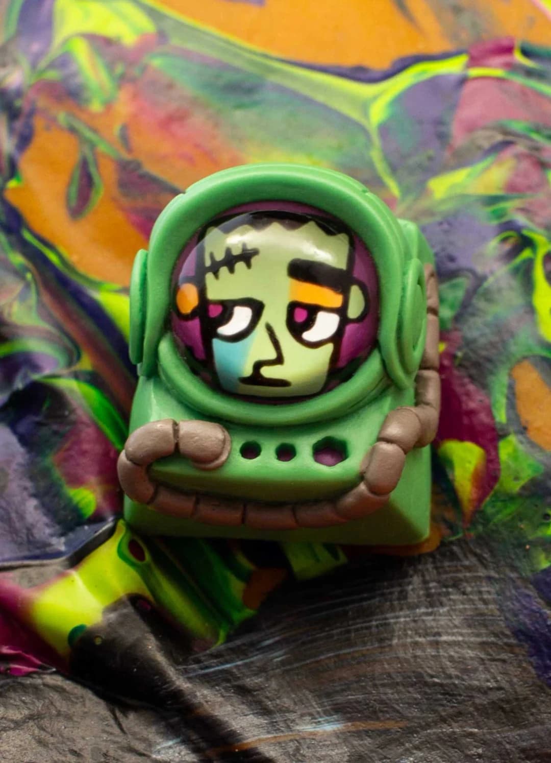 Frank Monster Mash Cadet with a green stitched-forehead face inside a green helmet.