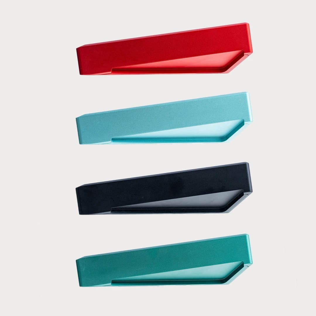 Side profiles of red, blue, black and green Aurum cases.